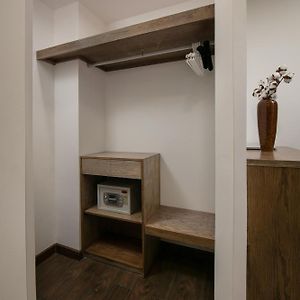 Two-Bedroom Family Suite Bathtub Balcony Street View